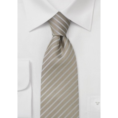 Tan color silk tie with narrow stripes