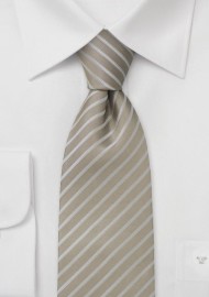 Tan color silk tie with narrow stripes