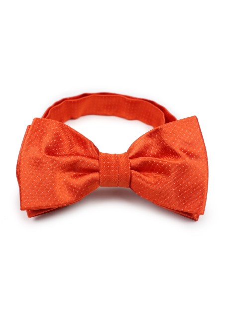 tangerine hued pin dot bow tie