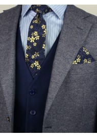 navy and metallic gold slim cut mens necktie with flower designs