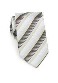 Striped Tie in Whites, Golds and Charcoals Rolled up