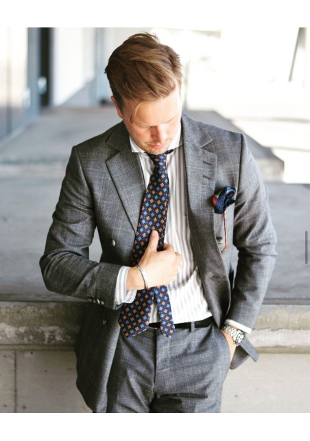 Vintage Print Tie in Navy and Orange Styled with Gray Suit