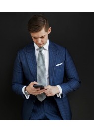 Dark Blue and Silver Houndstooth Check Tie Styled with Pinstripe Suit