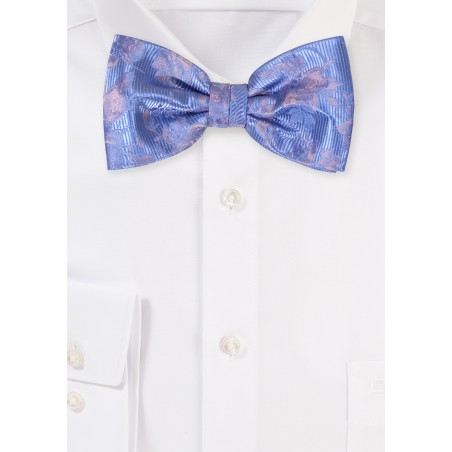 Light Blue Bowtie with Floral Design on a Ribbed Background