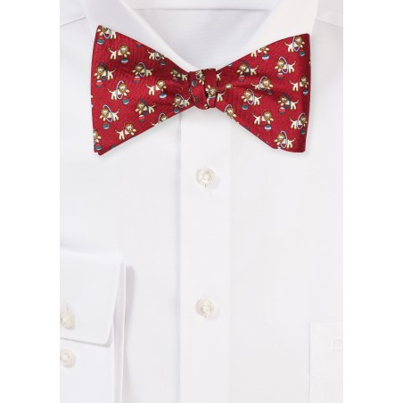 Self Tied Silk Bow tie with Circus Lion Print in Burgundy and Gold