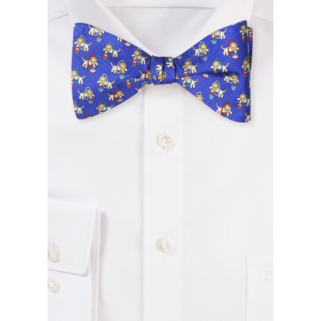 Self Tied Silk Bow tie with Circus Lion Print in Royal Blue and Gold