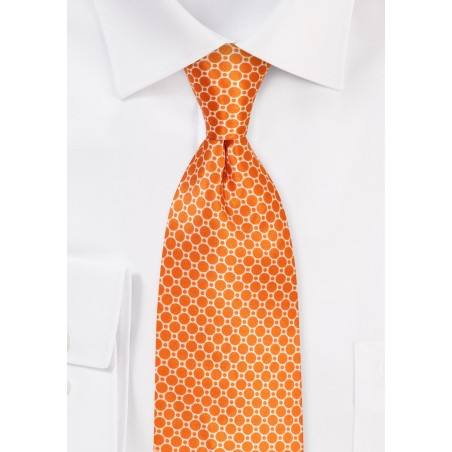 Geometric Print on Satin Silk in Harvest Pumpkin Orange