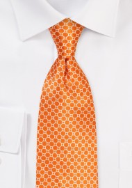 Geometric Print on Satin Silk in Harvest Pumpkin Orange